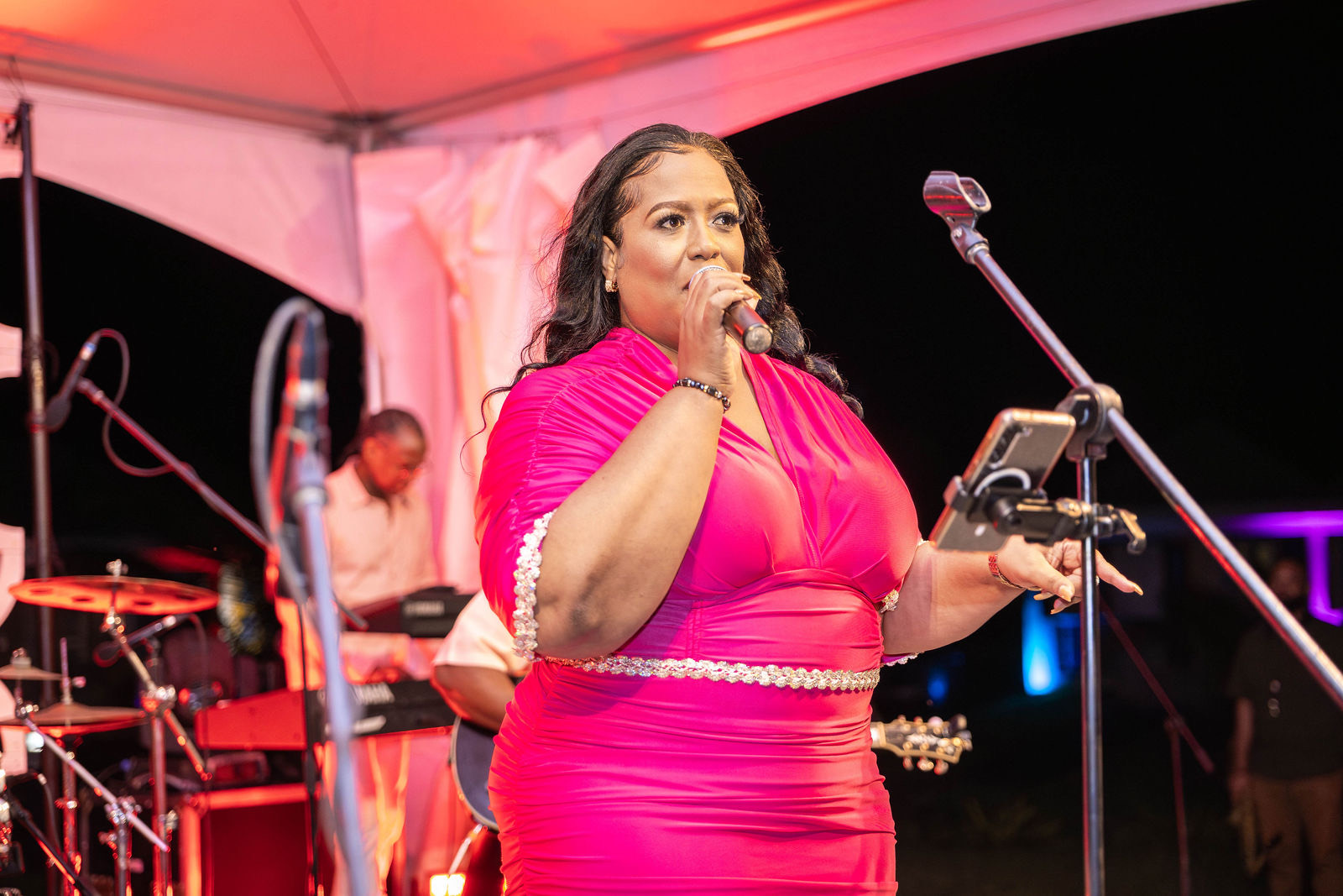 Queen B performing at a resort event