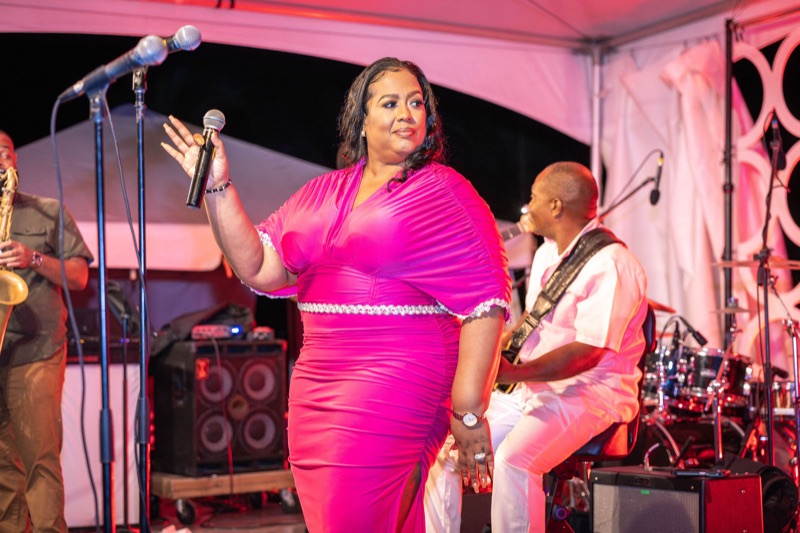 Queen B with guitarist and saxophonist at Malliouhana