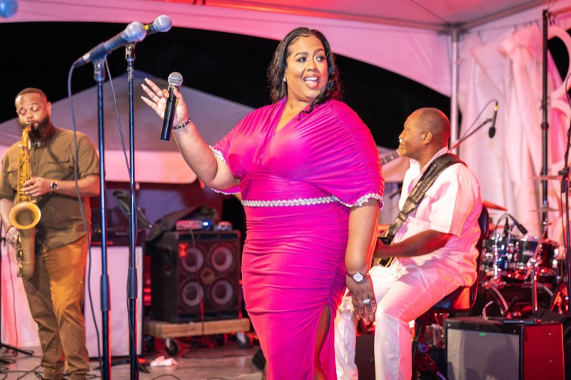 Queen B with saxophone and guitar at Malliouhana